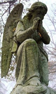 20070710111102-prayingangelbyrotenonedq6.jpg
